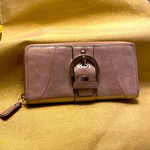 COACH Soho Pink Champagne leather zip around accordion style leather wallet.